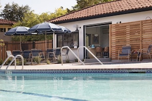 Outdoor pool, pool umbrellas, sun loungers