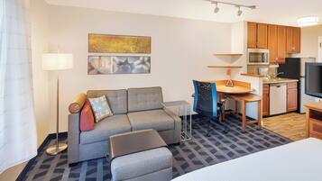 Desk, blackout drapes, iron/ironing board, free cribs/infant beds