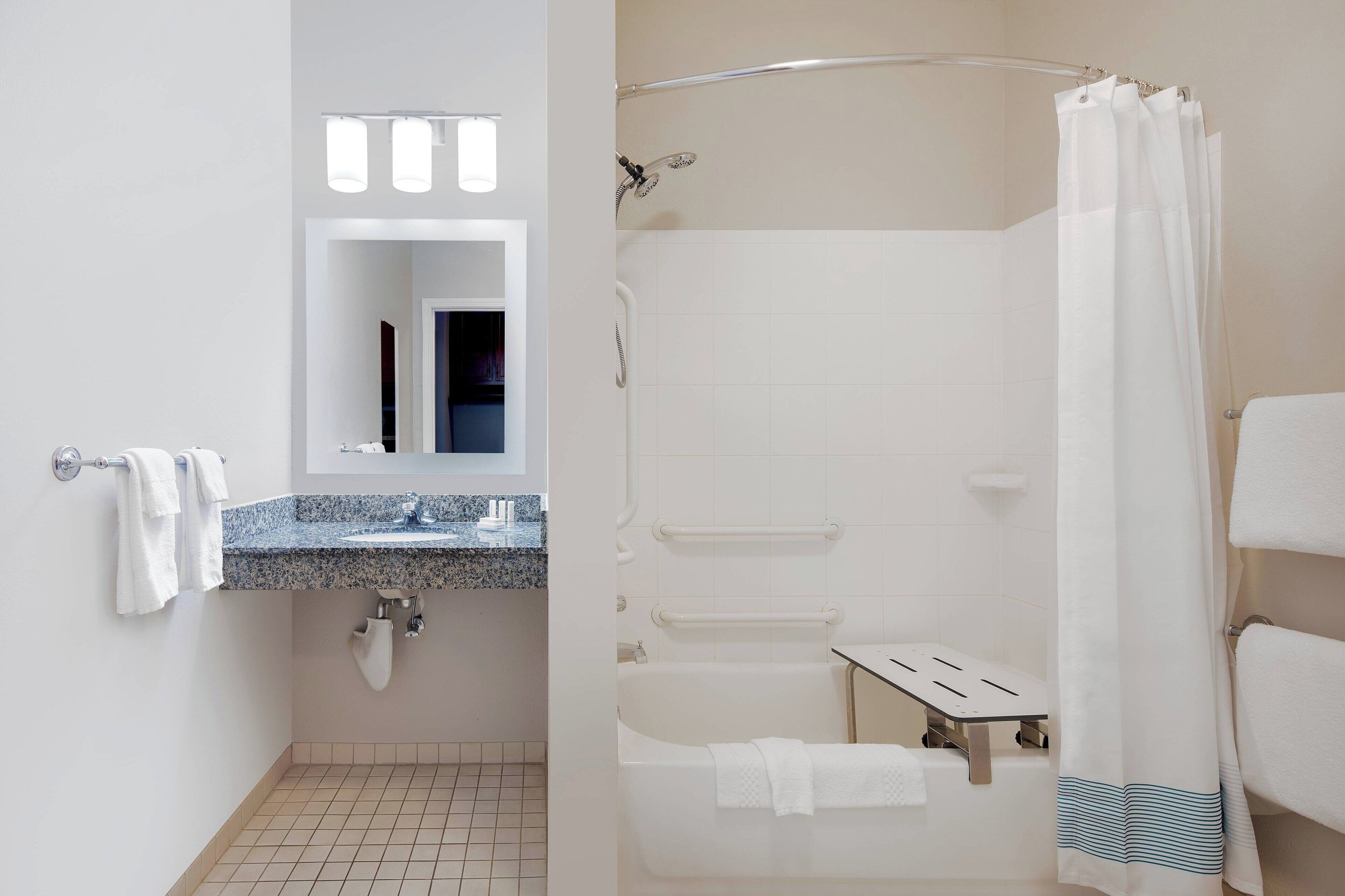 studio, 2 queen beds (mobility/hearing accessible, tub) | bathroom | combined shower/bathtub, free toiletries, hair dryer, towels