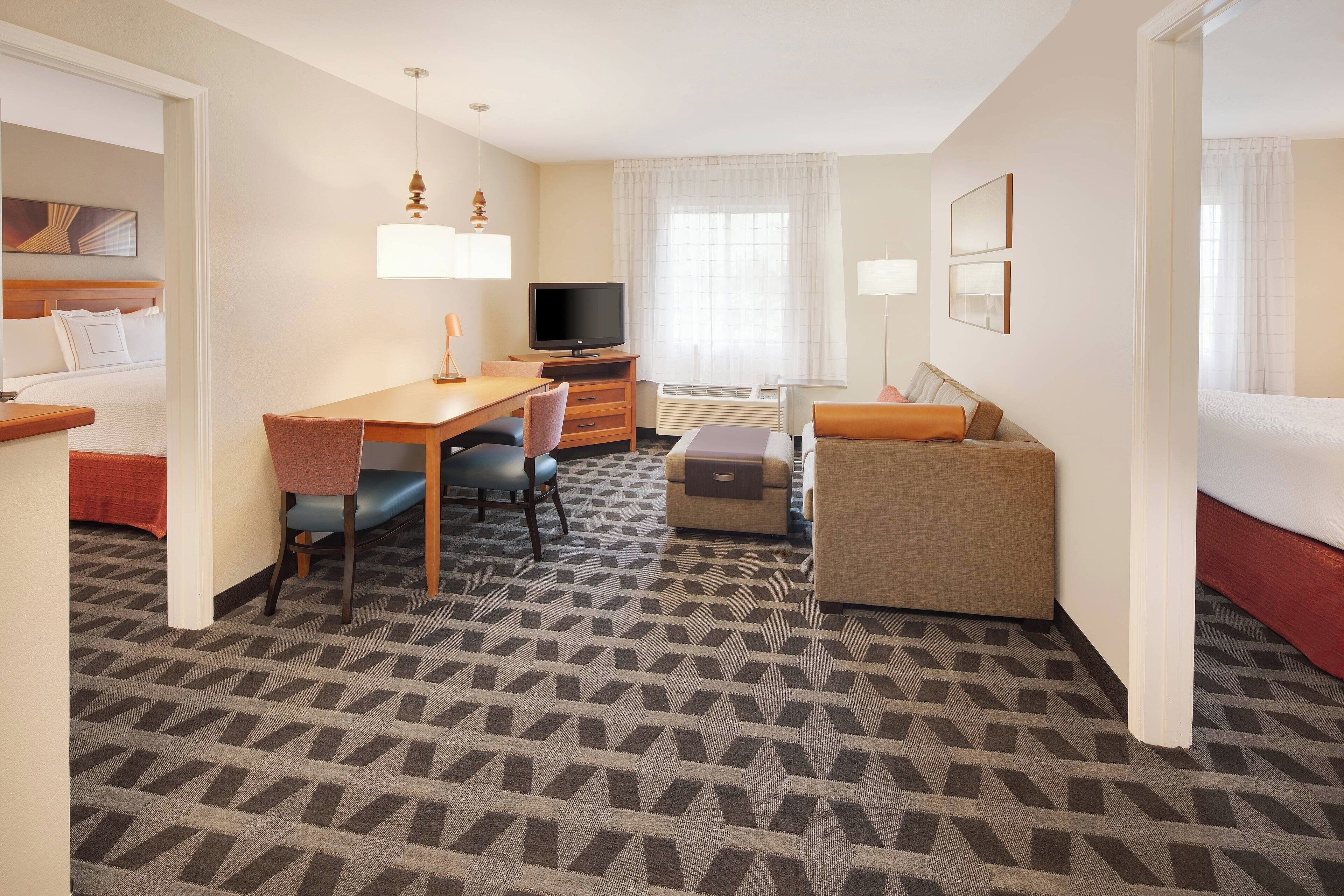 desk, blackout curtains, iron/ironing board, free cots/infant beds