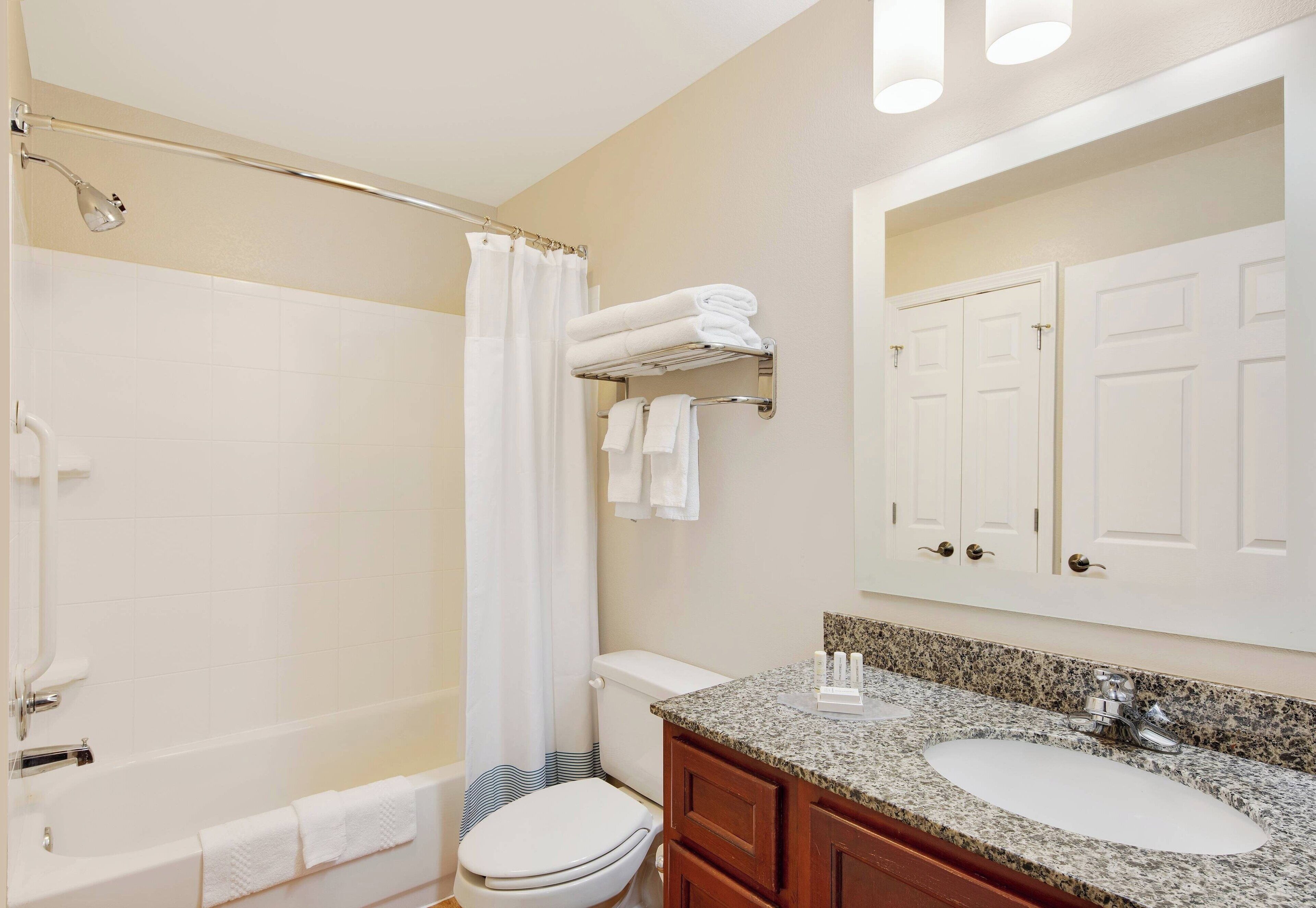 combined shower/bathtub, free toiletries, hair dryer, towels