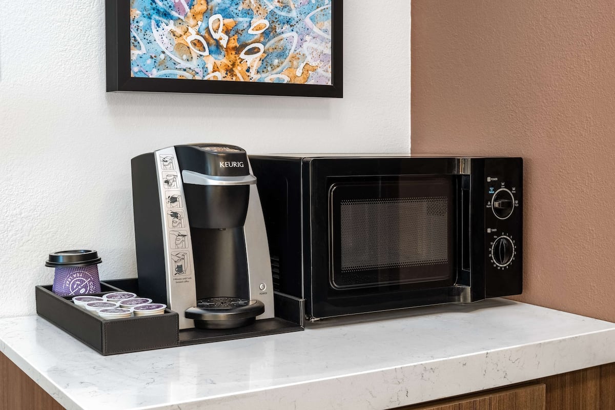 desk, blackout curtains, iron/ironing board, free cots/infant beds