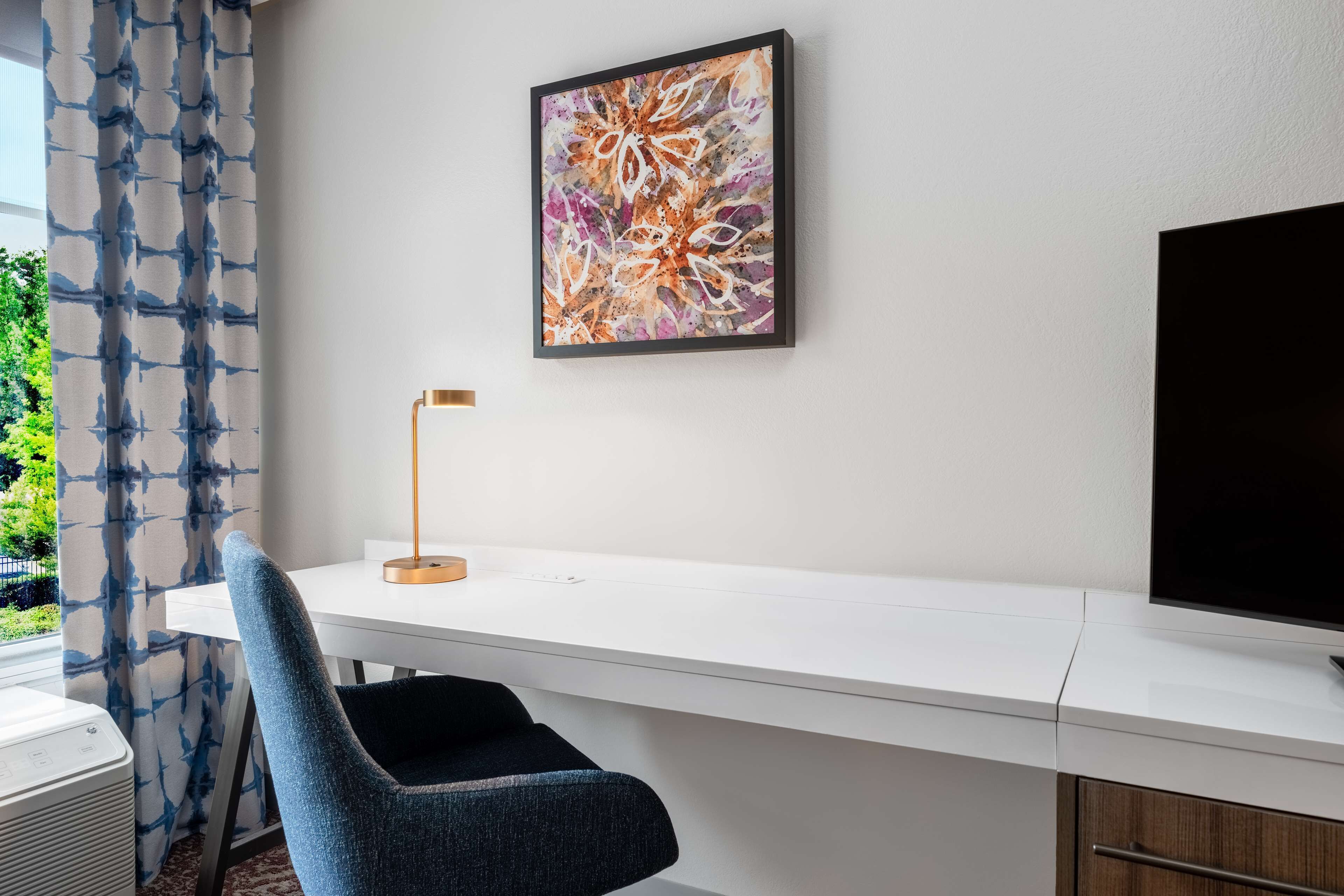 desk, blackout curtains, iron/ironing board, free cots/infant beds