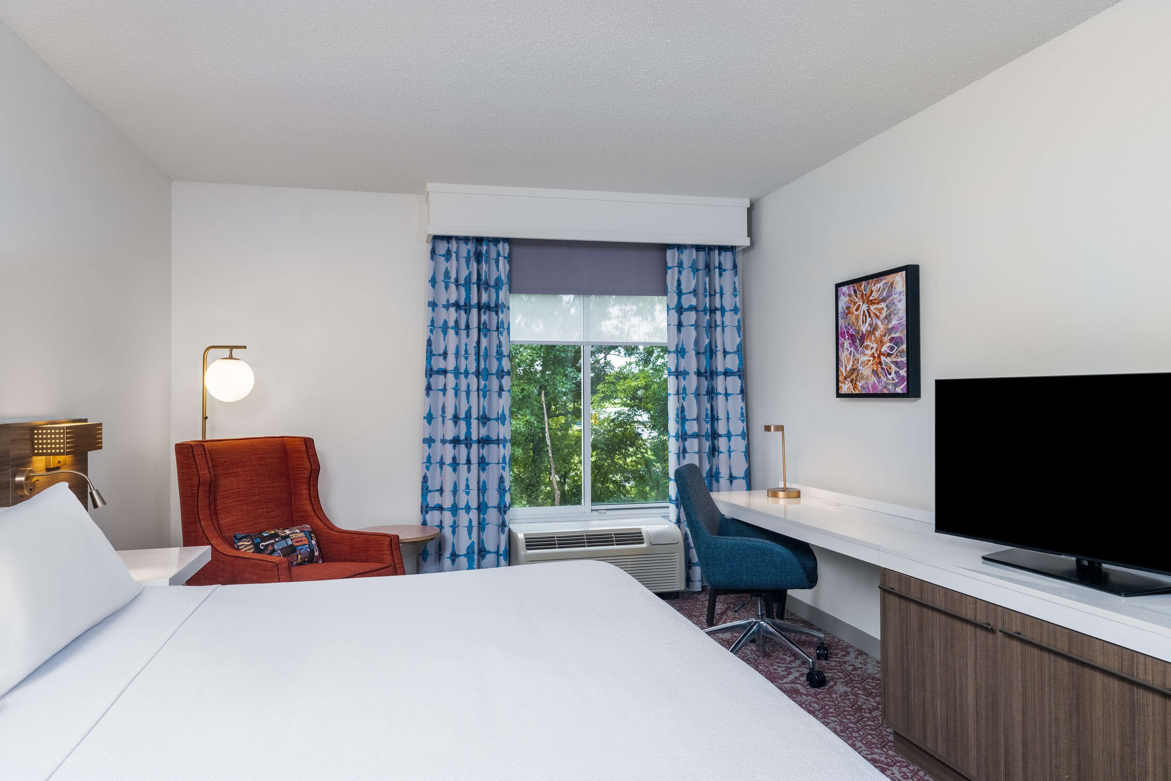 desk, blackout curtains, iron/ironing board, free cots/infant beds