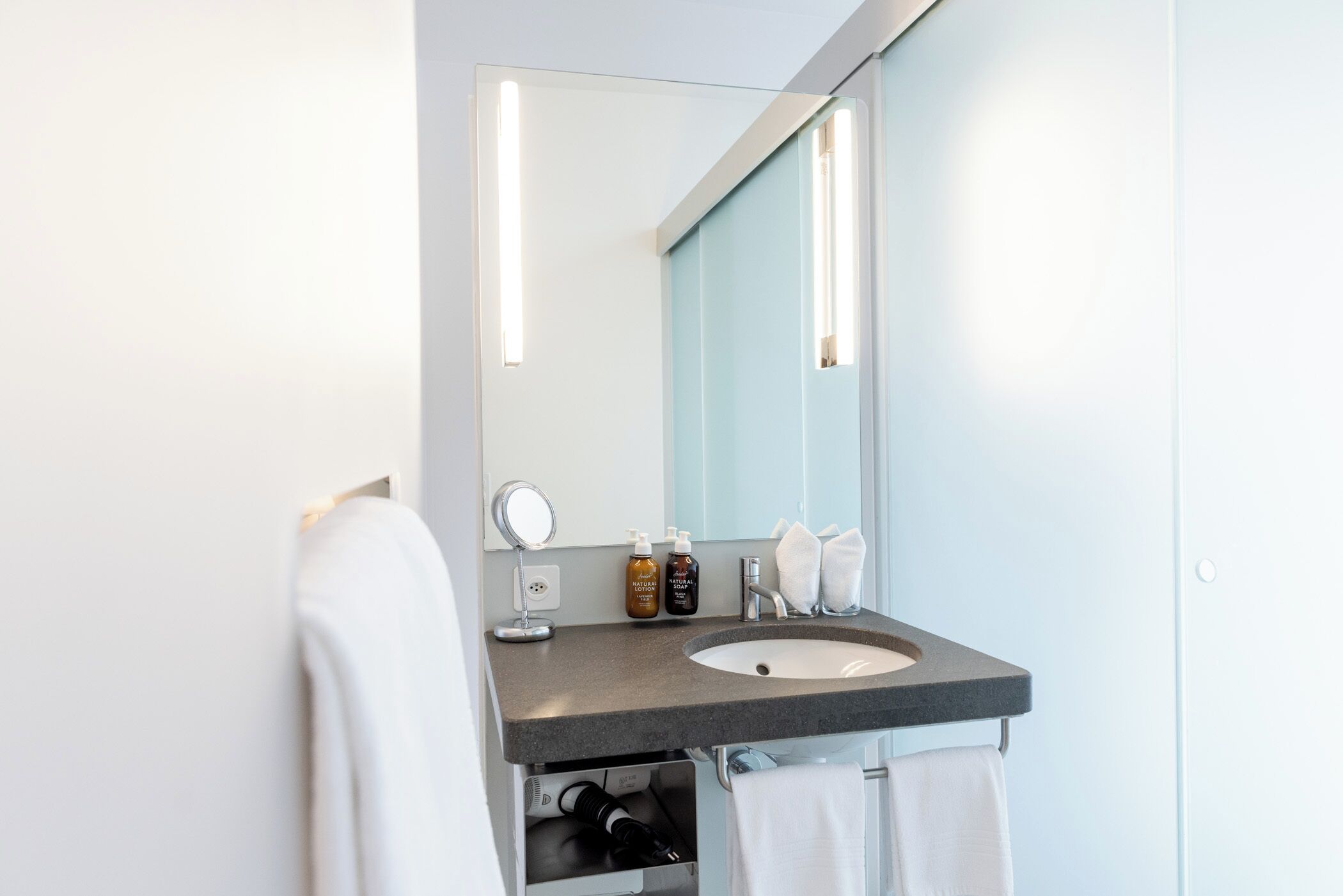 small design room | bathroom | free toiletries, hair dryer, heated floors, towels