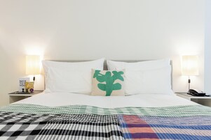 Hypo-allergenic bedding, free minibar, in-room safe, desk