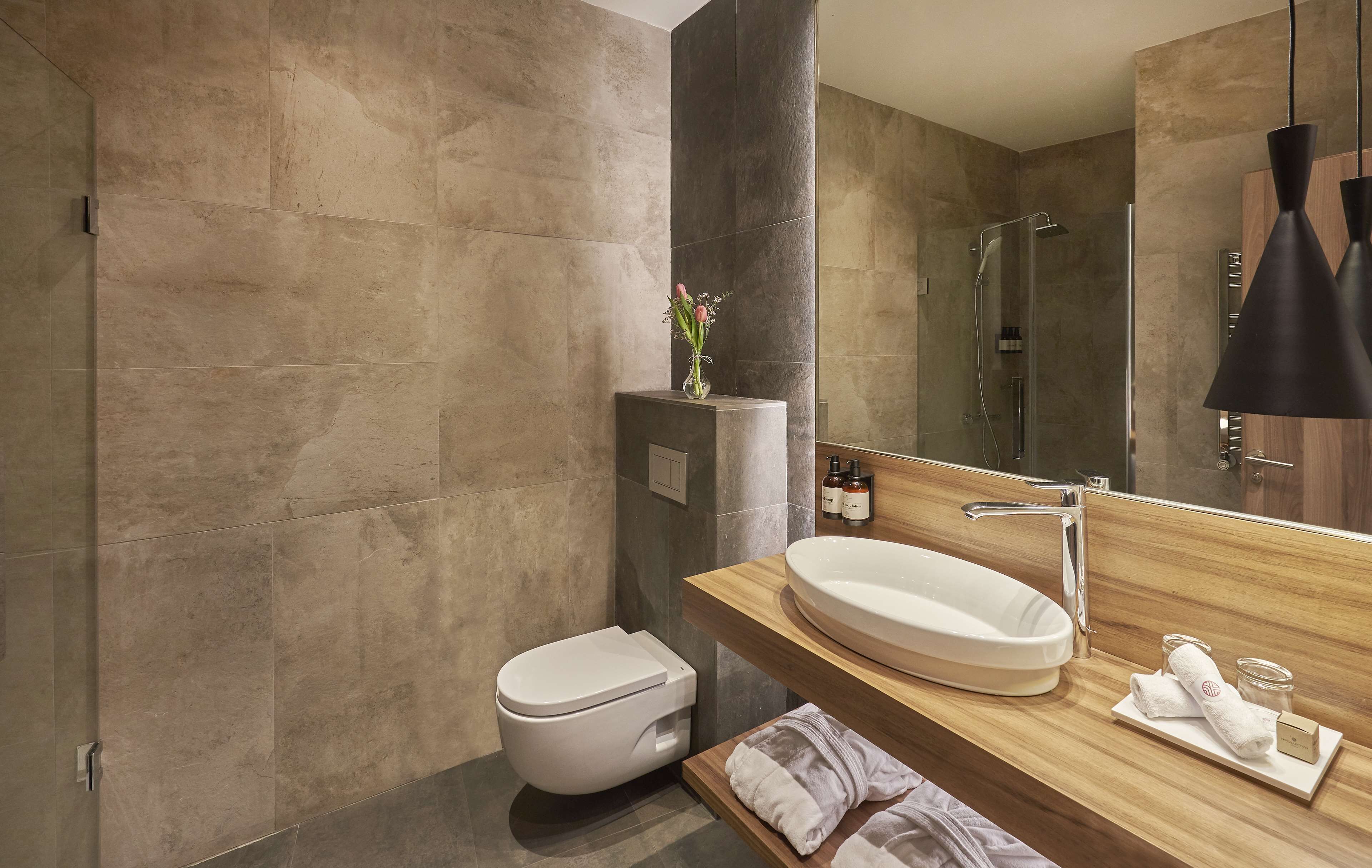 shower, eco-friendly toiletries, hair dryer, bathrobes