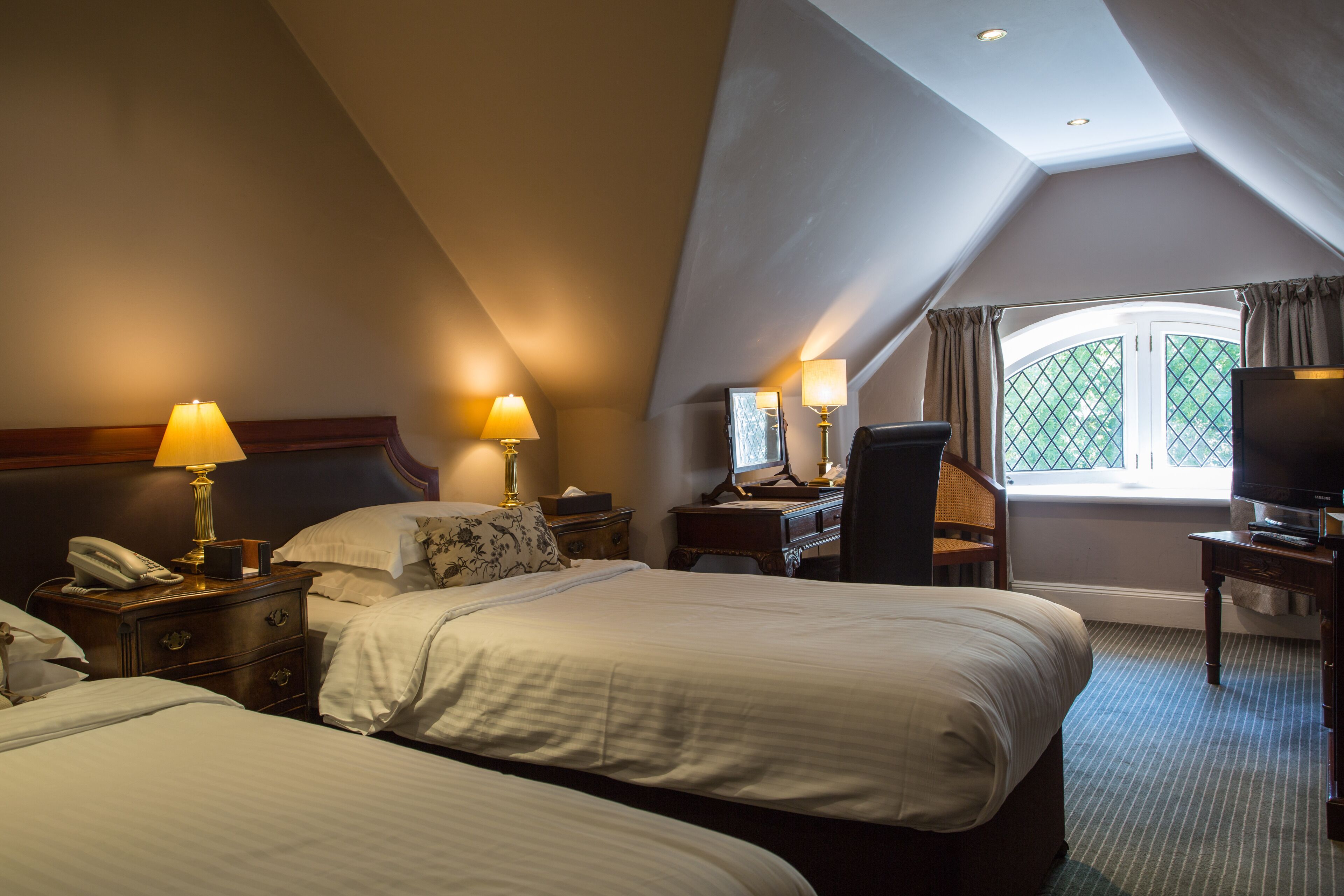 classic double or twin room | minibar, individually decorated, individually furnished, desk