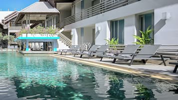 Outdoor pool, open 8:00 AM to 7:00 PM, pool umbrellas, pool loungers