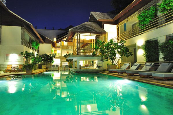 Outdoor pool, open 8:00 AM to 7:00 PM, pool umbrellas, pool loungers