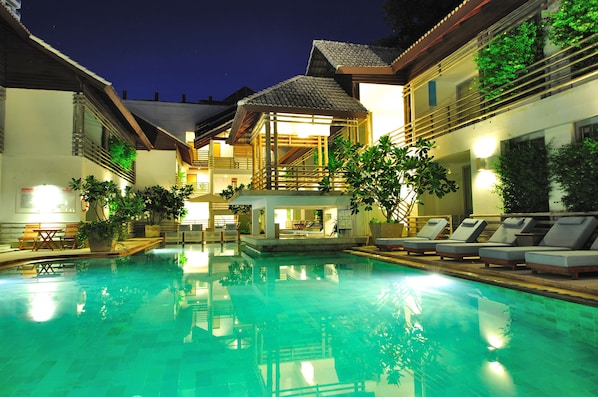 Outdoor pool, open 8:00 AM to 7:00 PM, pool umbrellas, pool loungers
