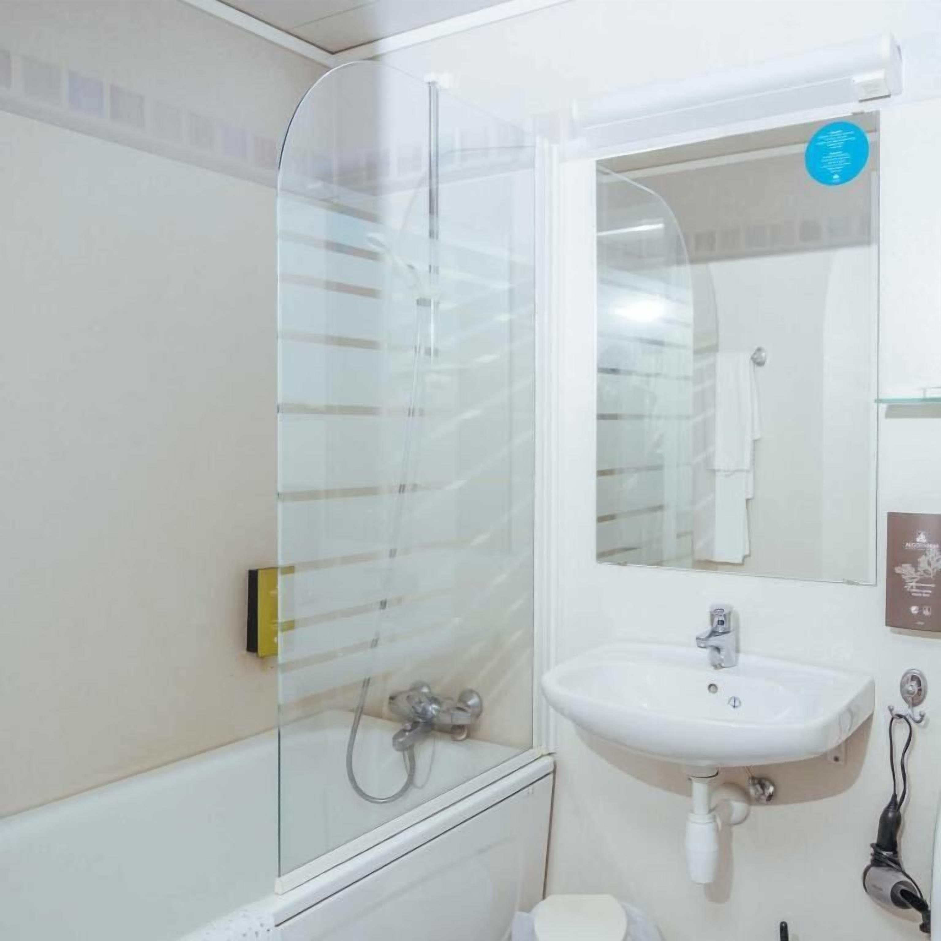 standard double room | bathroom | hair dryer, towels