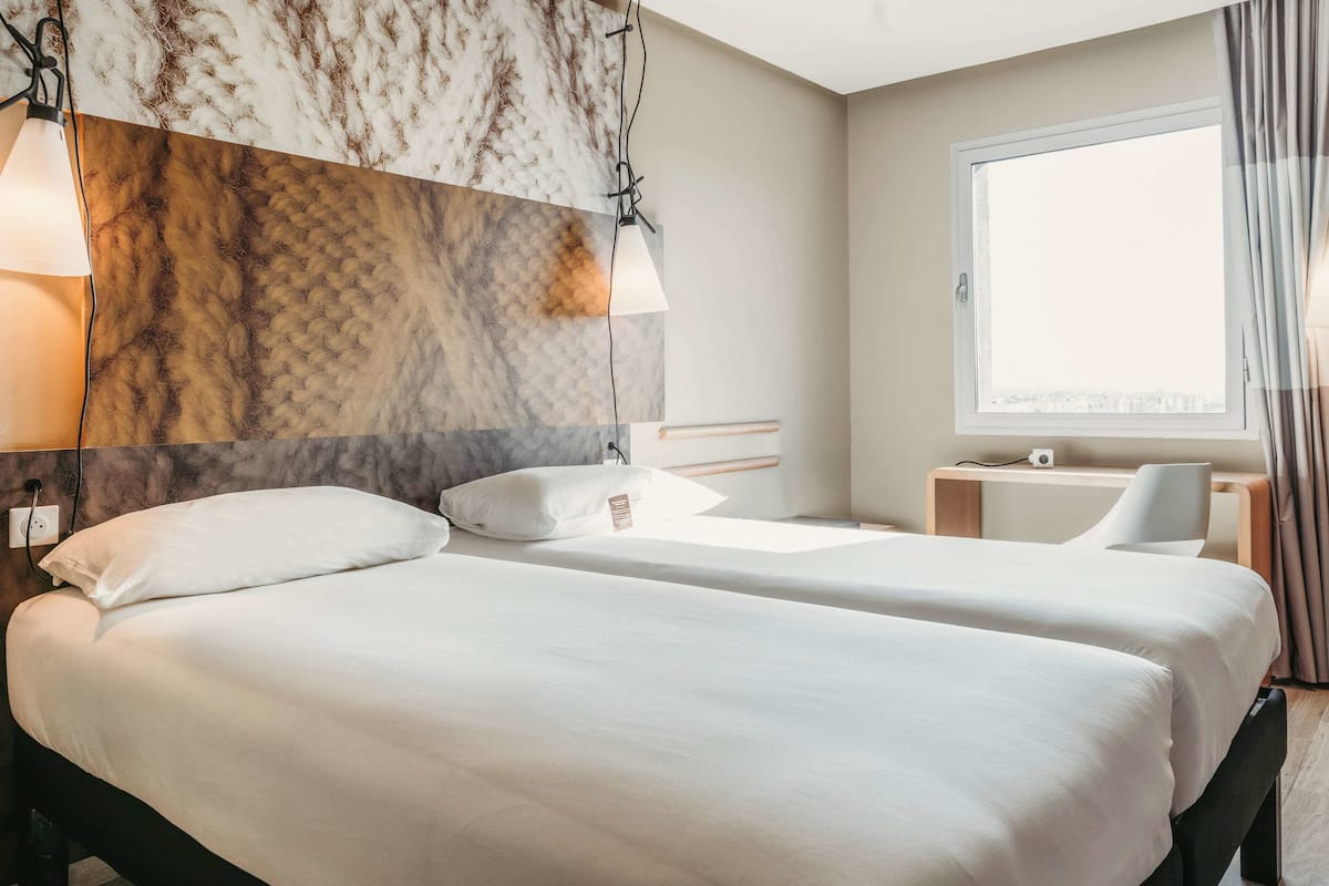 standard room, 2 single beds | premium bedding, desk, soundproofing, iron/ironing board