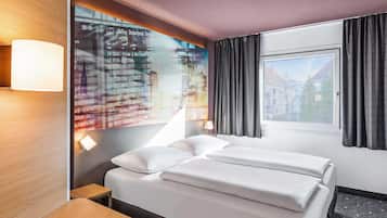 Twin kamer | Een bureau, geluiddichte muren, gratis wifi, beddengoed