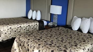 Desk, blackout drapes, iron/ironing board, bed sheets
