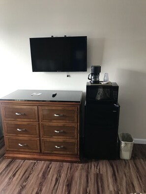 Desk, blackout drapes, iron/ironing board, bed sheets
