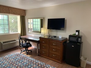 Desk, blackout drapes, iron/ironing board, bed sheets