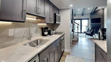 Deluxe Studio Loft 302 | Private kitchen | Fridge, microwave, stovetop, coffee/tea maker