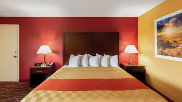 1 dormitori, cortines opaques i planxa i posts de planxar