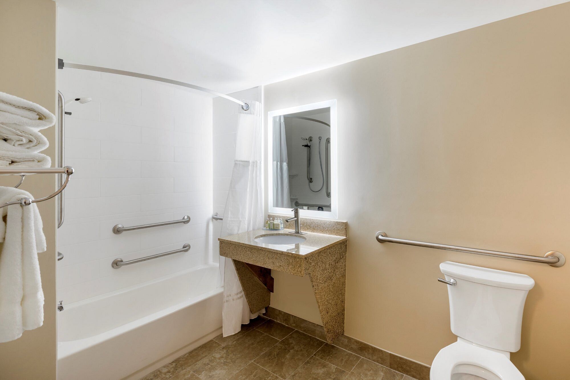 room, 1 king bed, accessible (nonsmoking- bathtub) | bathroom | combined shower/bathtub, hair dryer, towels