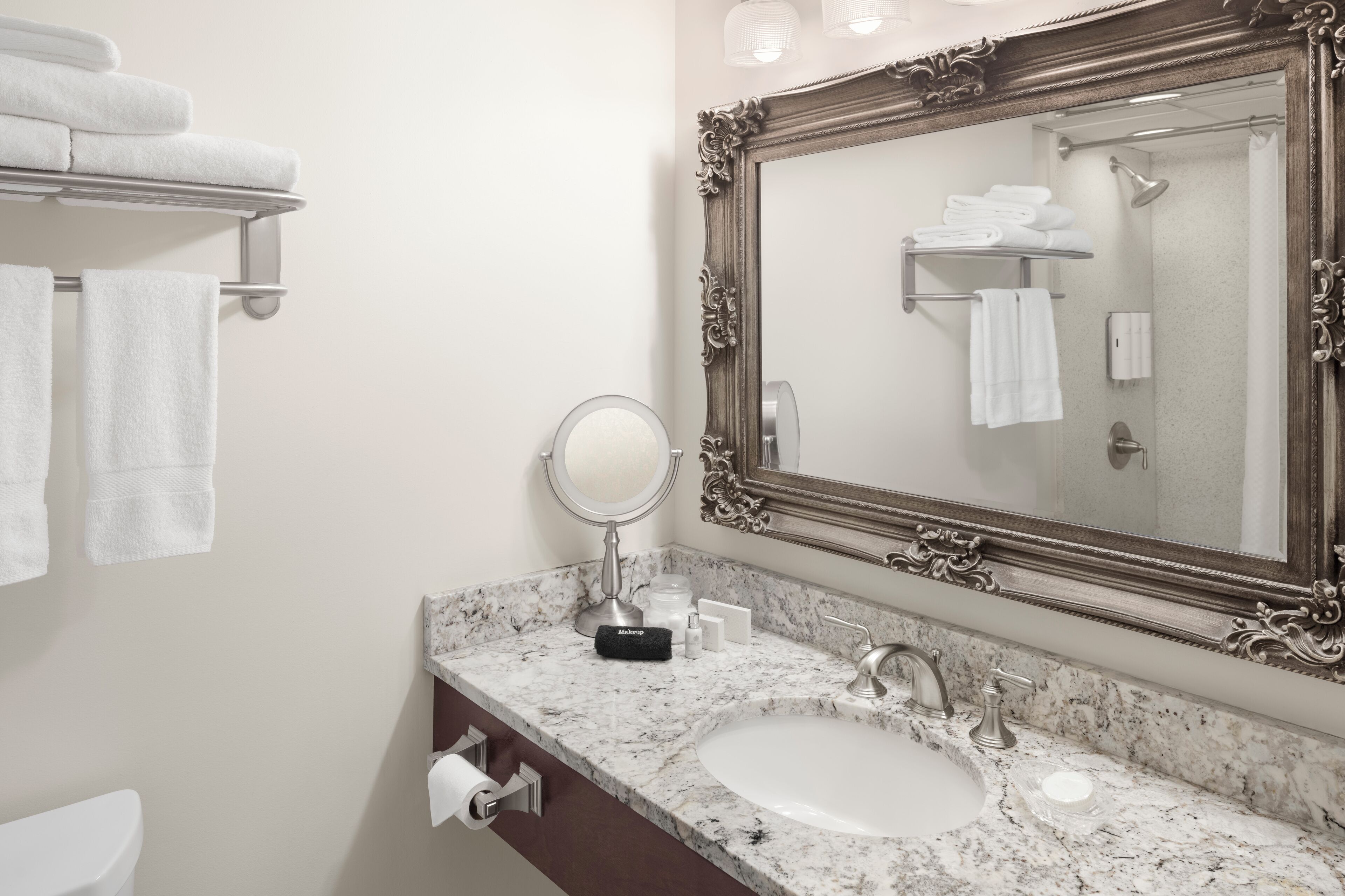 deluxe room, 1 king bed | bathroom | designer toiletries, hair dryer, bathrobes, towels