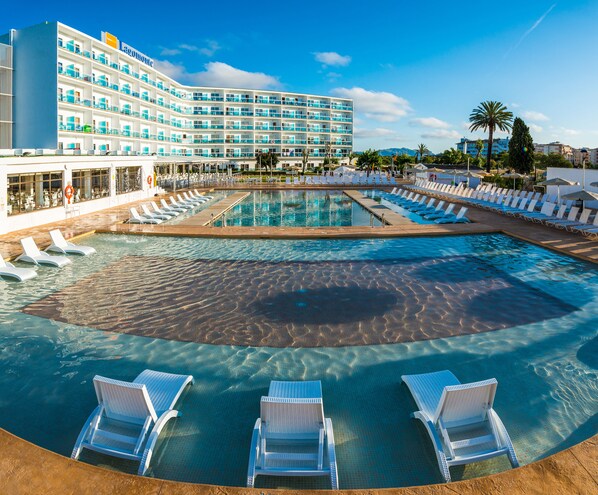 Outdoor pool, open 10 AM to 6 PM, pool loungers