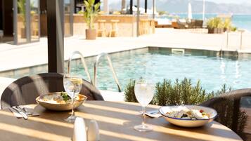 Breakfast, lunch, dinner served; pool views