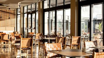 Breakfast, lunch, dinner served; pool views
