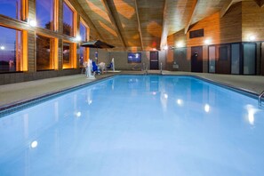 Indoor pool, open 7:00 AM to 11:00 PM, pool loungers