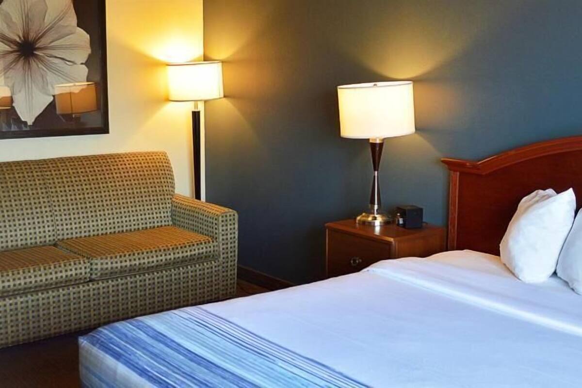 Desk, blackout drapes, iron/ironing board, free cribs/infant beds