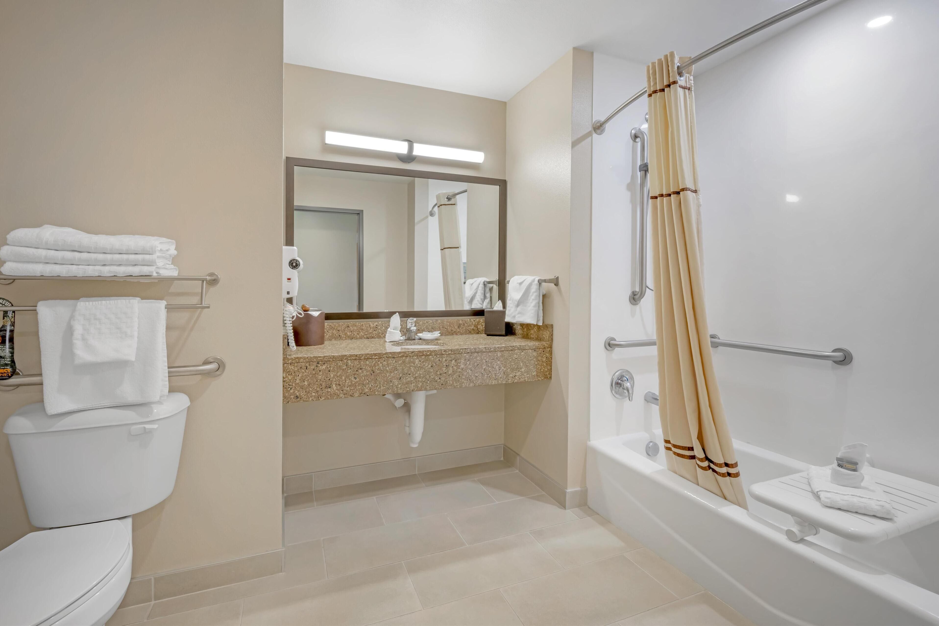 standard room, 2 queen beds, accessible, refrigerator & microwave | bathroom | combined shower/bathtub, free toiletries, hair dryer, towels