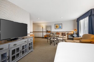 Suite, 1 King Bed, Non Smoking, Refrigerator & Microwave (with Sofabed) | Desk, laptop workspace, iron/ironing board, WiFi