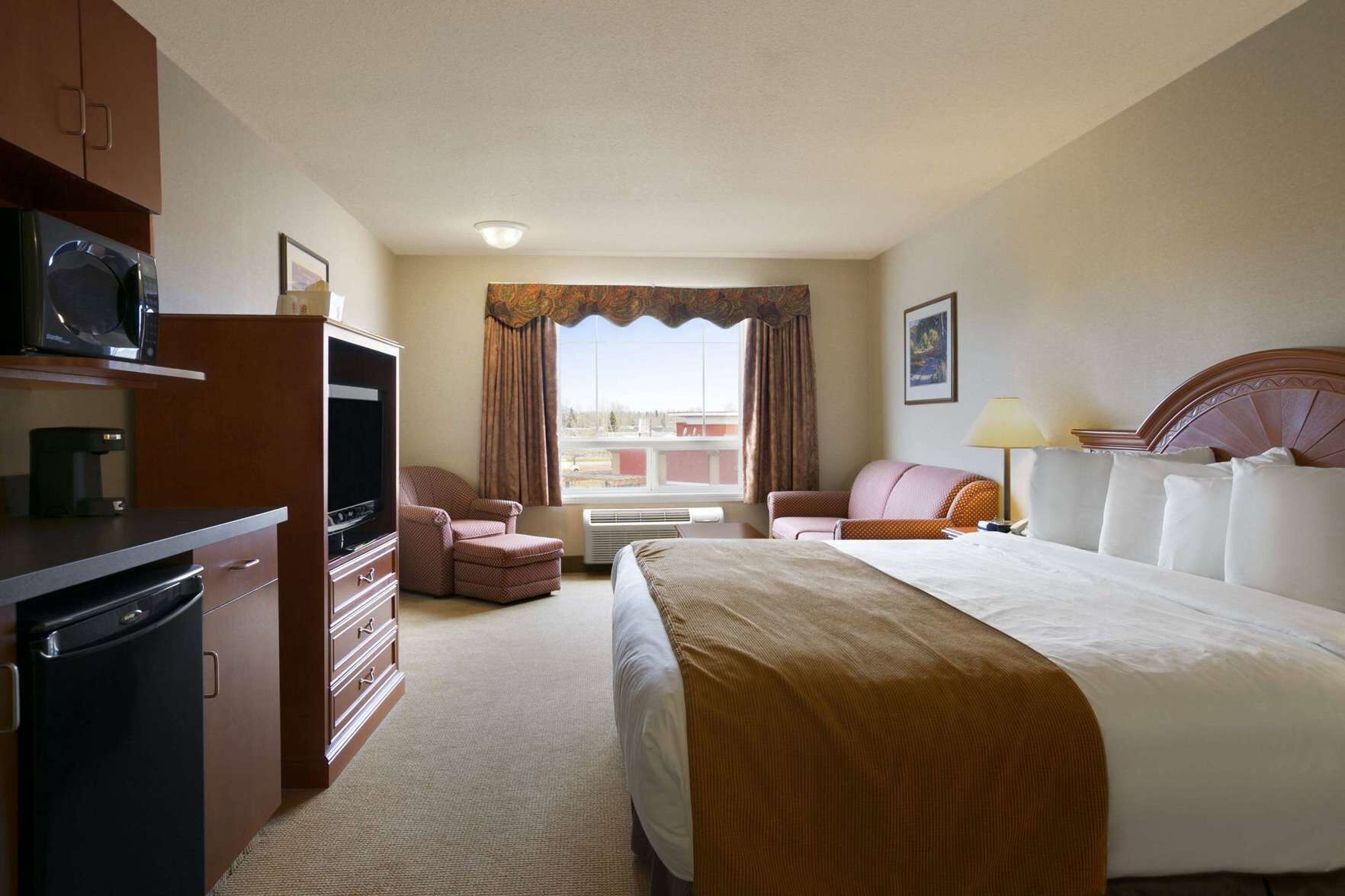 In-room safe, desk, iron/ironing board, free cribs/infant beds