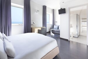 Superior Double Room | Minibar, in-room safe, desk, laptop workspace
