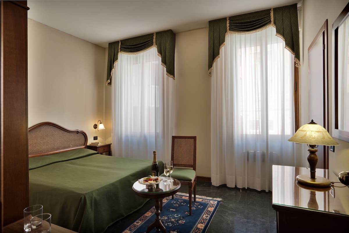 Double or Twin Room | Minibar, in-room safe, desk, free WiFi