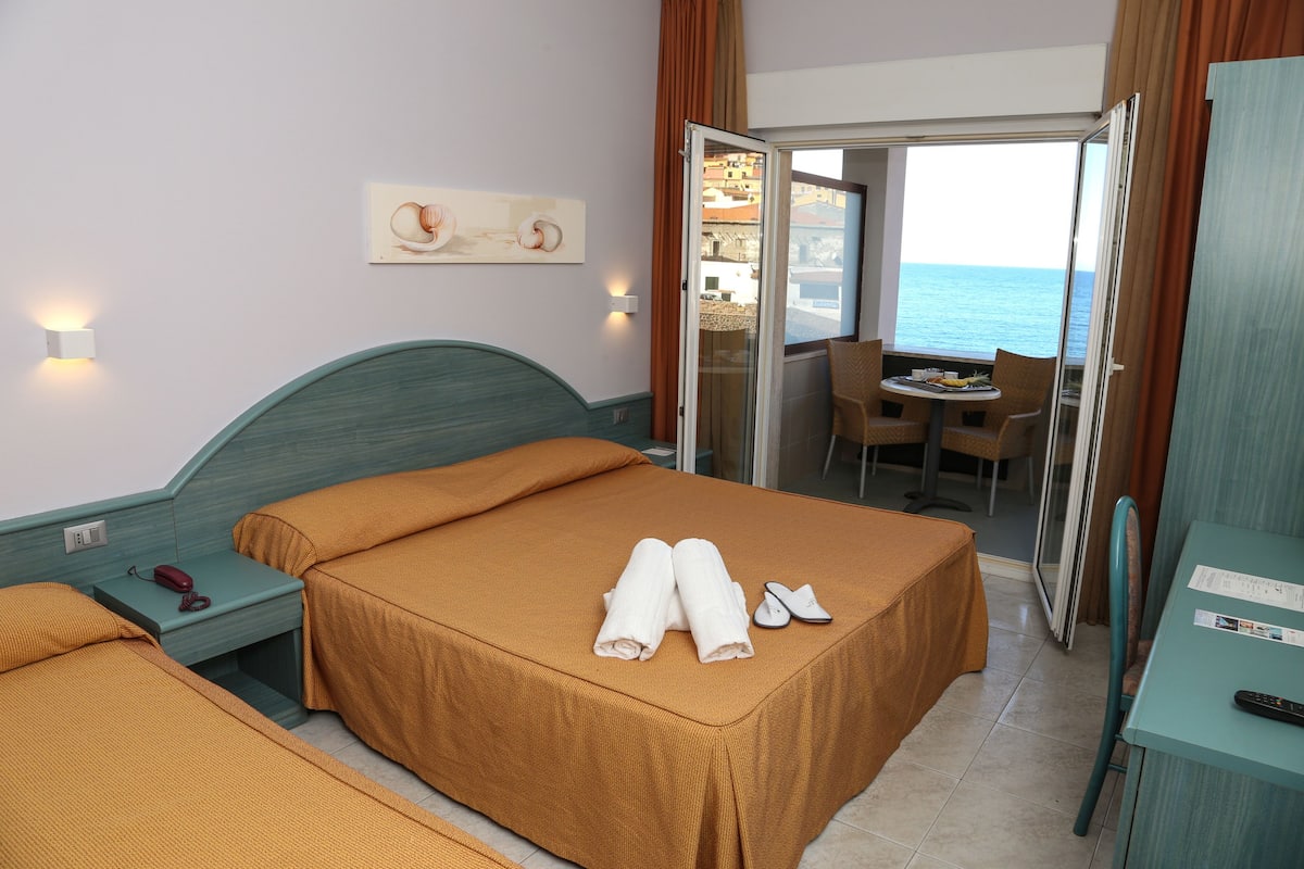 Panoramic Triple Room, Sea View | Minibar, in-room safe, blackout drapes, soundproofing