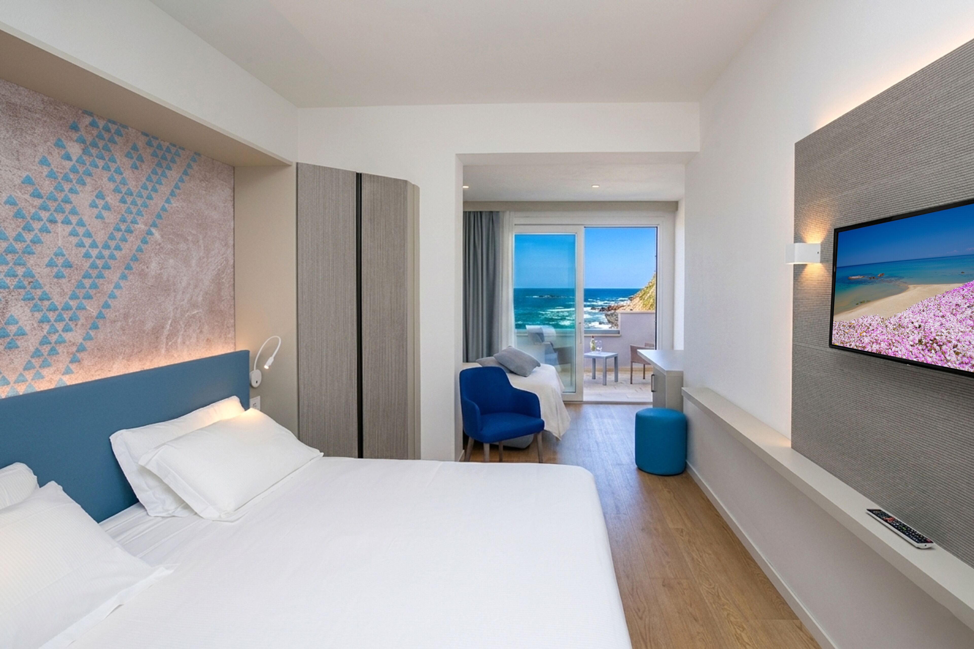 Panoramic Triple Room, Sea View | Down comforters, minibar, in-room safe, blackout drapes