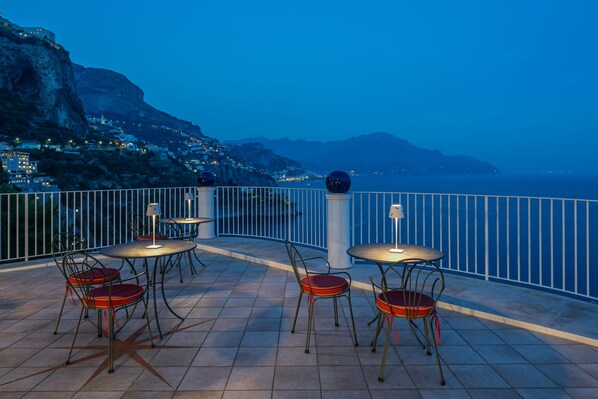Enjoy breathtaking views of the coastline from this outdoor space.