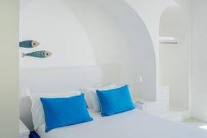 Sábanas italianas Frette y caja de seguridad en la habitación 