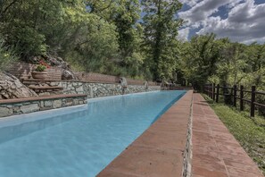 Outdoor pool, free pool cabanas, pool umbrellas