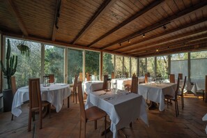 Breakfast, lunch, dinner served; local cuisine, garden views 