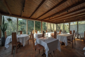 Breakfast, lunch, dinner served; local cuisine, garden views