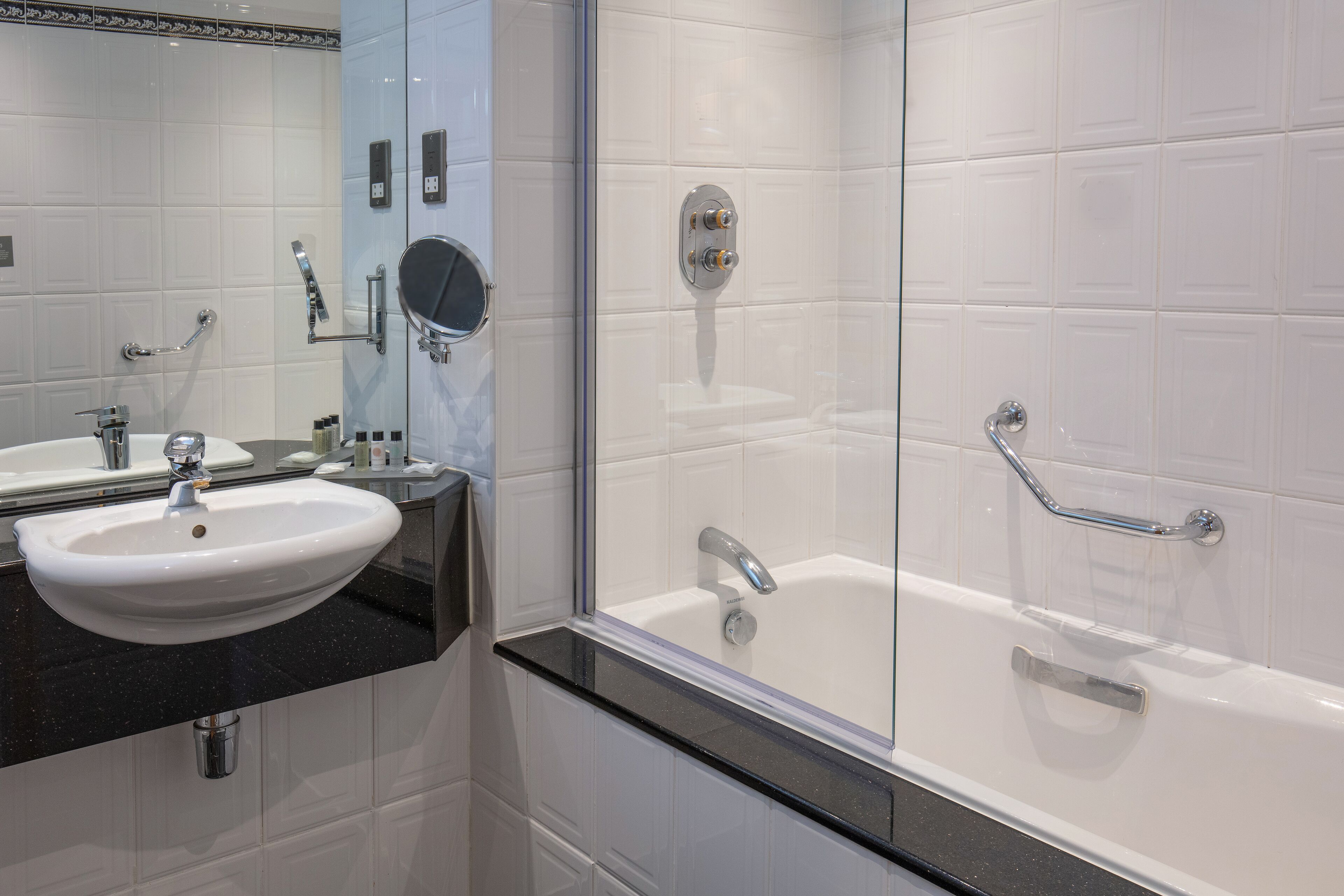 combined shower/bathtub, free toiletries, hair dryer, towels