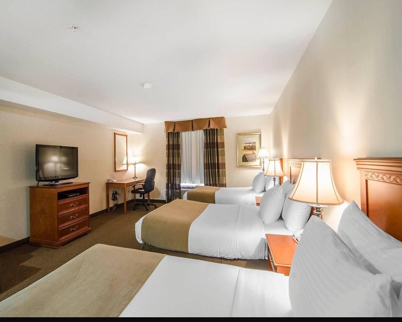 Room, Multiple Beds, Non Smoking (3 double beds) | Premium bedding, in-room safe, desk, blackout curtains
