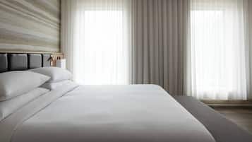 Suite ejecutiva, 1 habitación, no fumadores, vistas a la ciudad | Ropa de cama de alta calidad, caja fuerte, escritorio y cortinas opacas