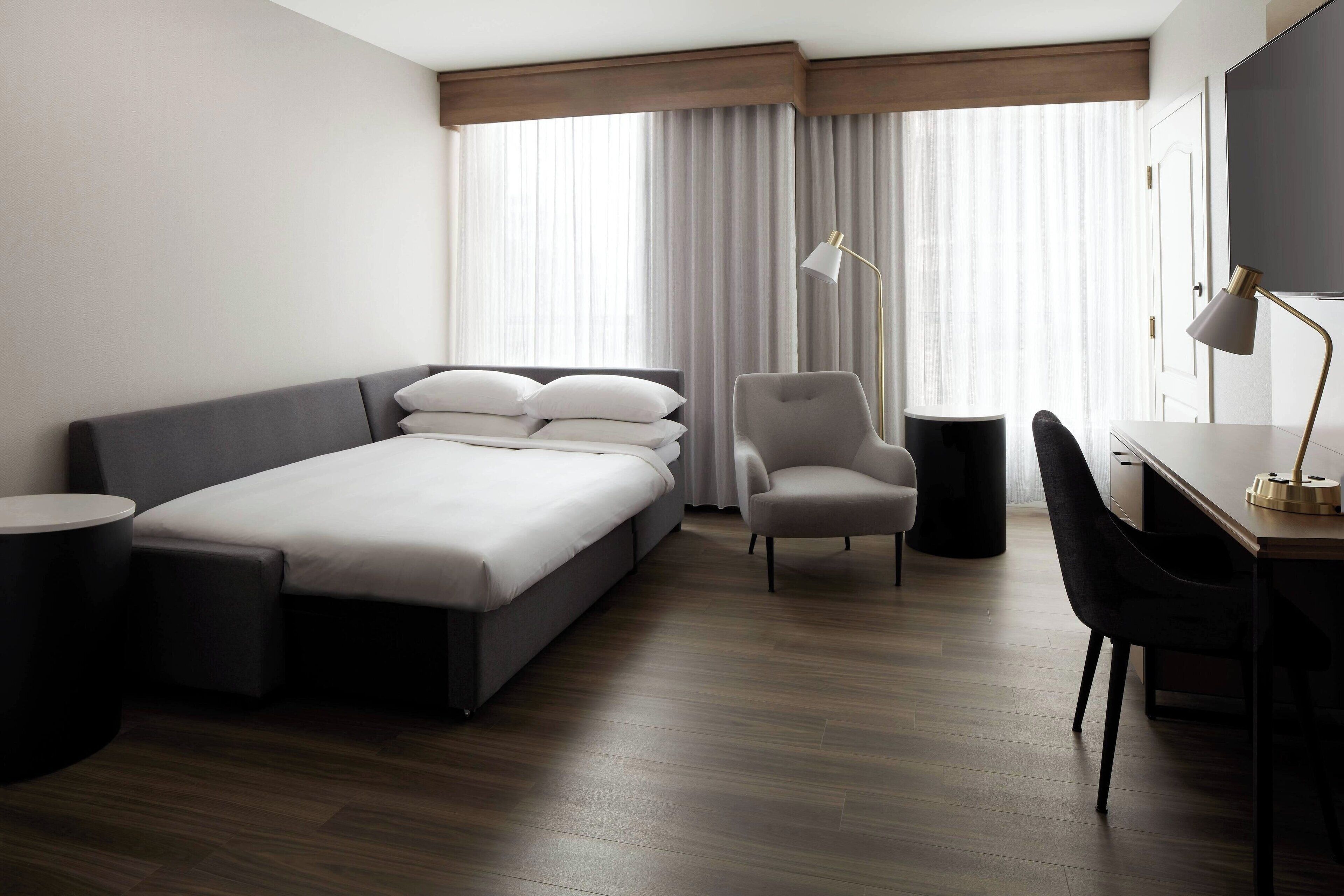 flat-screen tv, ipod dock, pay films