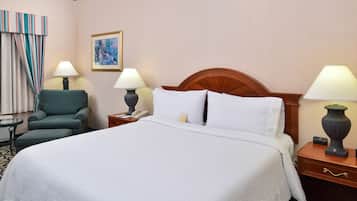 Desk, laptop workspace, blackout drapes, iron/ironing board