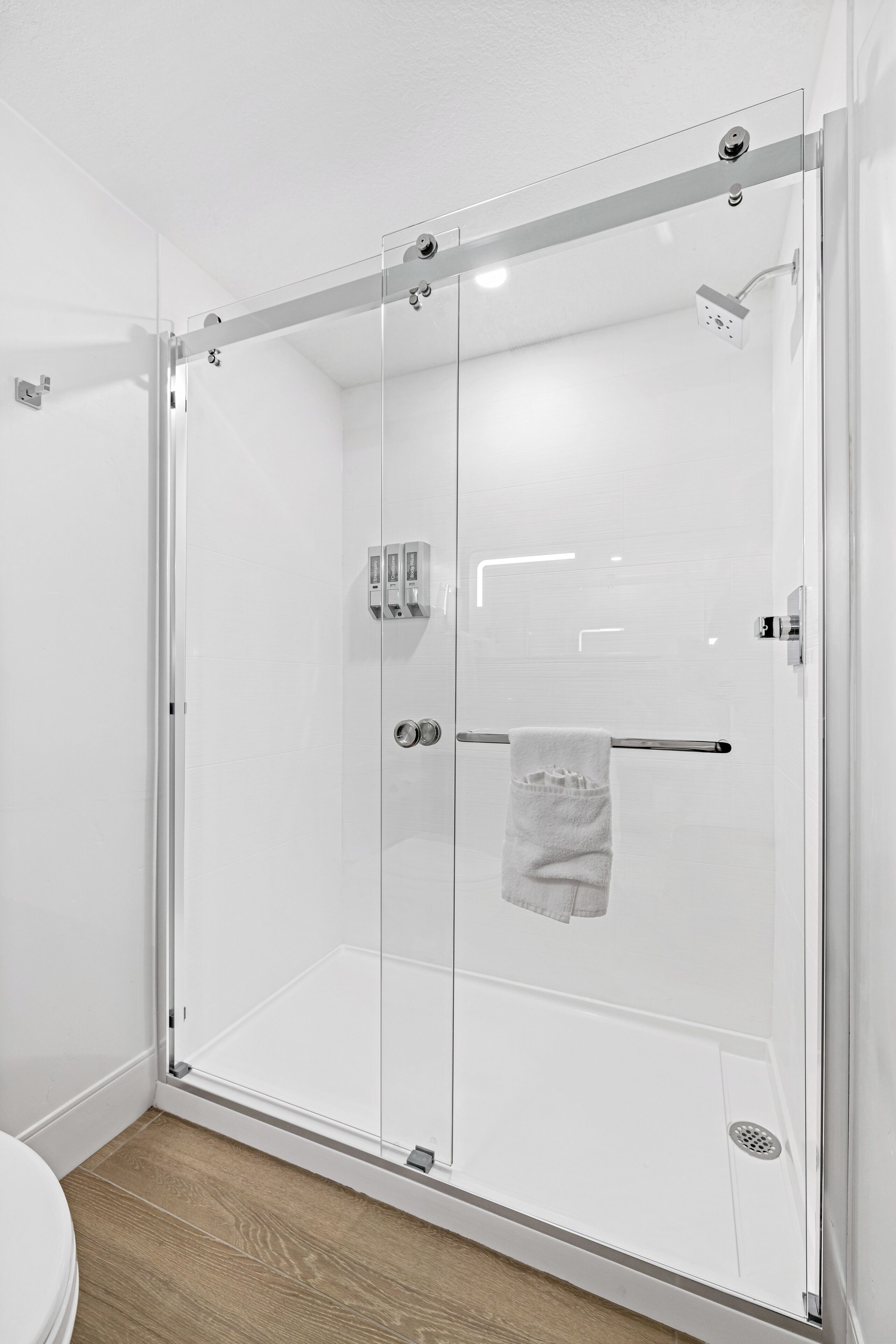 bathtub, hair dryer, towels