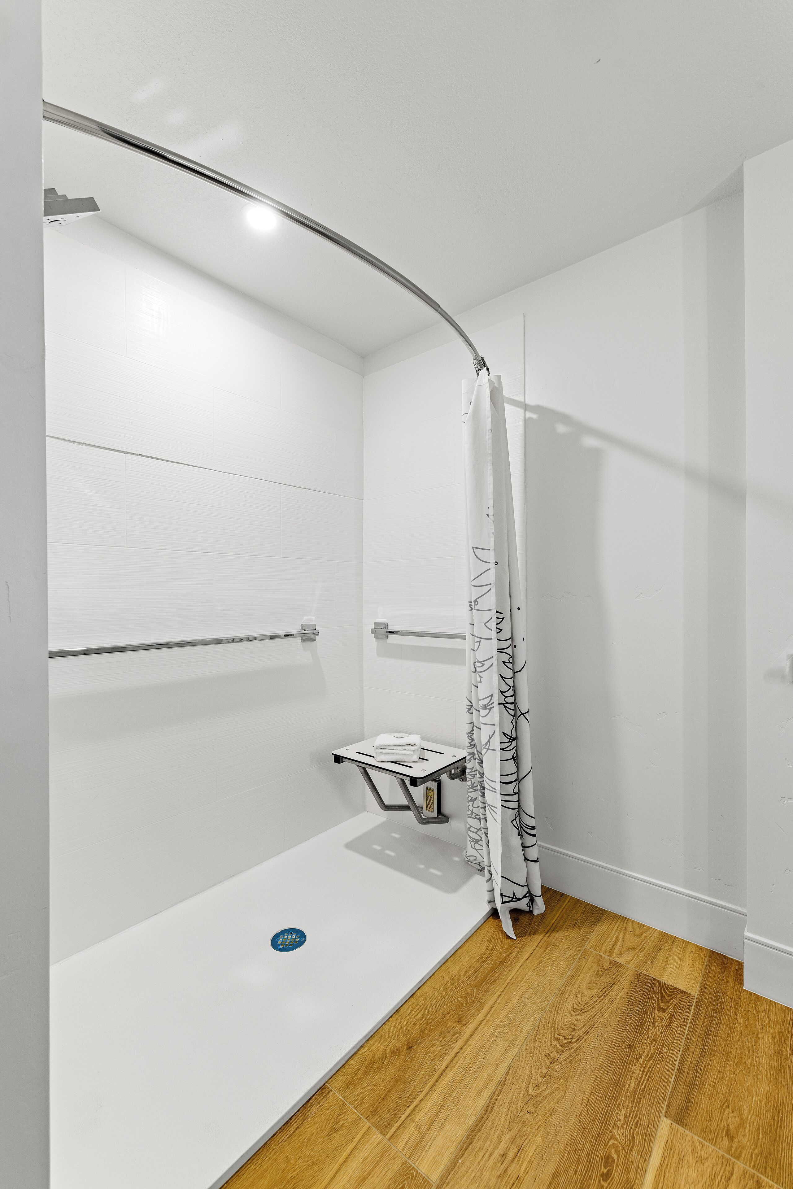 bathtub, hair dryer, towels