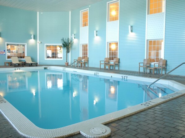 Indoor pool, open 8:00 AM to 11:00 PM, pool loungers